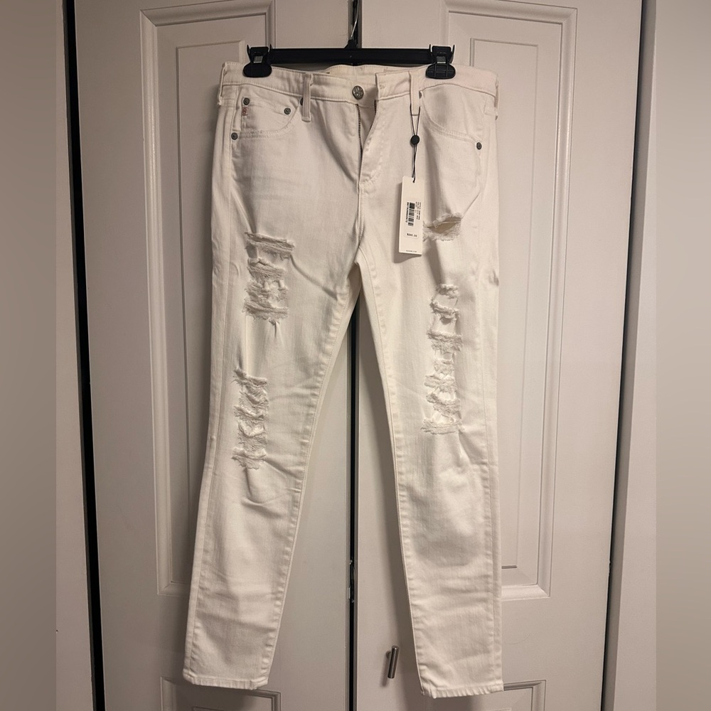 NWT. Never Worn. White AG distressed skinny jeans. Size 31